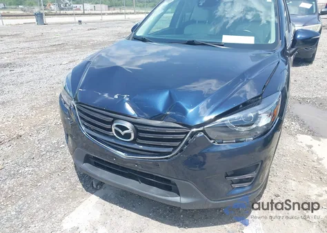 2016 Mazda Cx-5 Grand Touring z USA, uszkodzony, nr VIN JM3KE4DY8G0659429